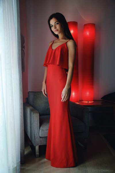 Dark haired goddess drops down her long red dress to show us her peachy ass and slender body  in Eternal Desire set Simply Red