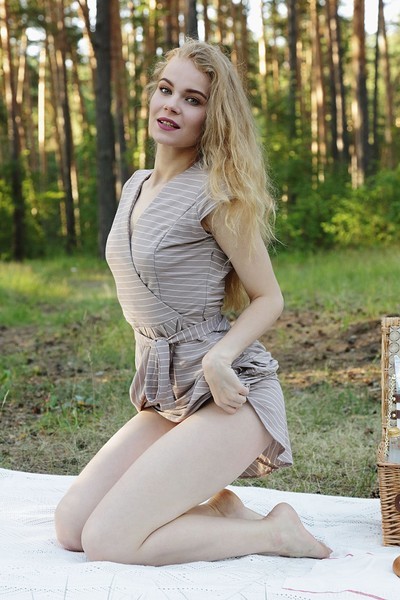 Curly blonde goddess Ellie poses naked in the forest presenting her pale body  in Metart set Infusion
